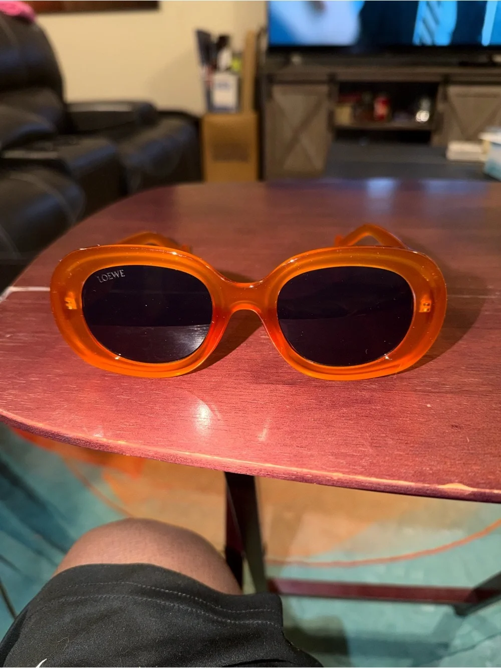 Loewe Orange Oval Sunglasses with Black Lenses